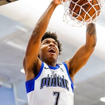 Osceola Magic forward Myron Gardner dunks during an NBA G League game.