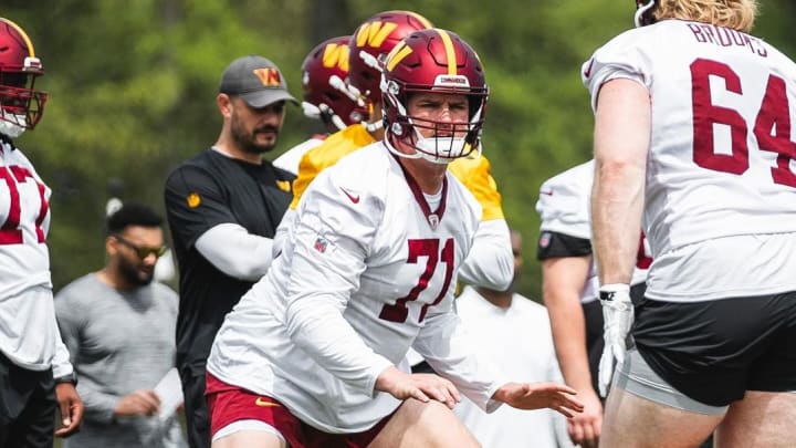 Washington Commanders offensive tackle Andrew Wylie returned to team drills after being held out for health reasons. 