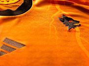 Roma's new away kit is orange.