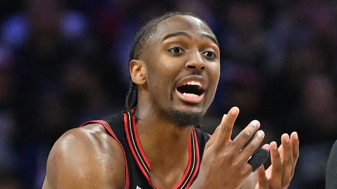 Apr 26, 2026; Philadelphia, Pennsylvania, USA; Philadelphia 76ers guard Tyrese Maxey (0) speaks with referee Josh Tiven (58) against the Boston Celtics during the second half at Xfinity Mobile Arena. Mandatory Credit: Eric Hartline-Imagn Images
