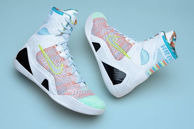 White and blue Nike Kobe sneakers.