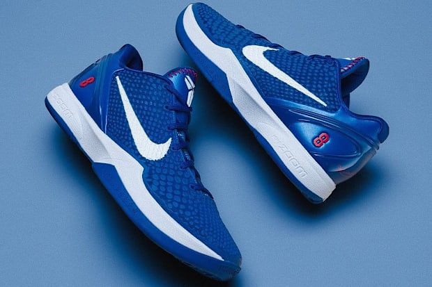 Blue and white Nike Kobe sneakers.