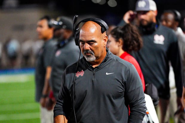 First-year Mater Dei football coach Raul Lara coaching in his debut against Corona Centennial on Thursday, Aug. 22, 2023.