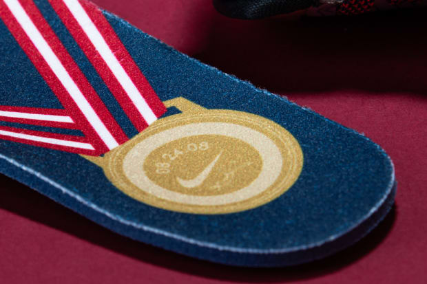 Navy and red Nike Kobe sneaker insoles.