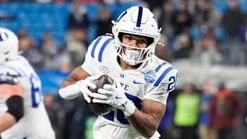 Dec 6, 2025; Charlotte, NC, USA; Duke Blue Devils running back Nate Sheppard (20) makes a catch in the first quarter against the Virginia Cavaliers during the 2025 ACC Championship game at Bank of America Stadium. Mandatory Credit: Jim Dedmon-Imagn Images