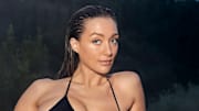 Penny Lane was photographed by Ben Watts in Portugal. Swimsuit by Agent Provocateur.