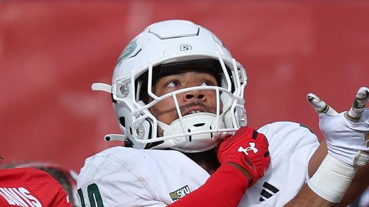 Cal Poly Mustangs wide receiver Michael Briscoe battles for a pass