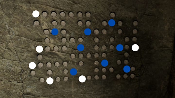 The final puzzle in Indiana Jones and the Great Circle with spots to indicate where the relics should be placed.