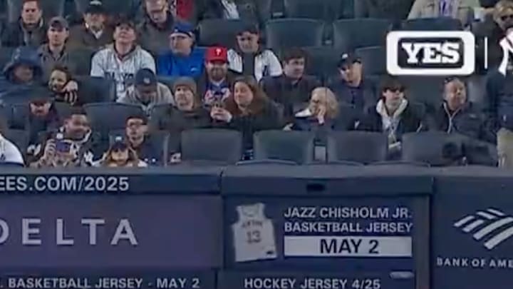 A fan wearing Phillies and Mets gear at a Yankees game distracted viewers. A fan wearing Phillies and Mets gear at a Yankees game distracted viewers.