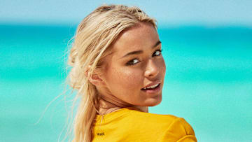Olivia Dunne was photographed by Ben Watts in Bermuda. Shirt by MONSE.