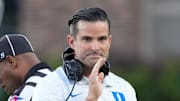 Aug 28, 2025; Durham, North Carolina, USA;  Duke Blue Devils head coach Manny Diaz reacts during the warmups before the game against the Elon Phoenix at Wallace Wade Stadium. Mandatory Credit: James Guillory-Imagn Images