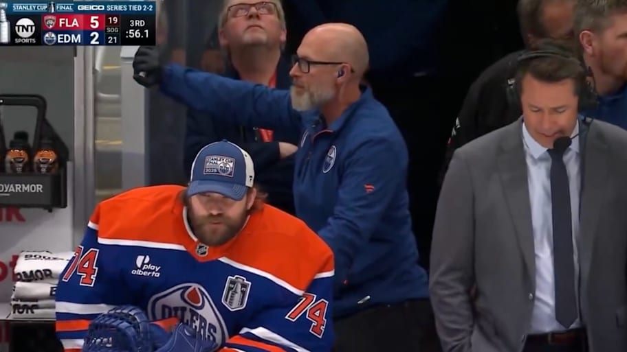 Edmonton Oilers goalie Stuart Skinner sits next to TNT's between-the-benches analyst Brian Boucher during Game 5 of the Stanley Cup Final. | Screenshot via Shan on X