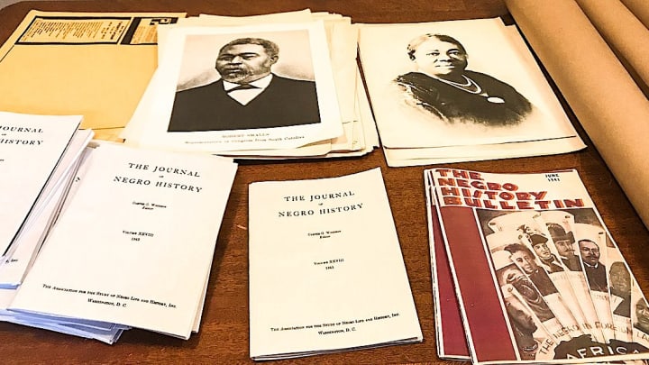 Materials at the Carter G. Woodson Home National Historic Site in Washington, D.C., show portraits of Woodson and education leader Mary McLeod Bethune