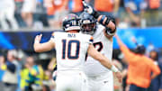Sep 21, 2025; Inglewood, California, USA; Denver Broncos offensive tackle Garett Bolles (72) and Denver Broncos quarterback Bo Nix (10) react after a play during the first half against the Los Angeles Chargers at SoFi Stadium. 