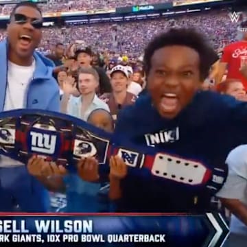 Russell Wilson took in WWE's SummerSlam at MetLife Stadium on Sunday night. 