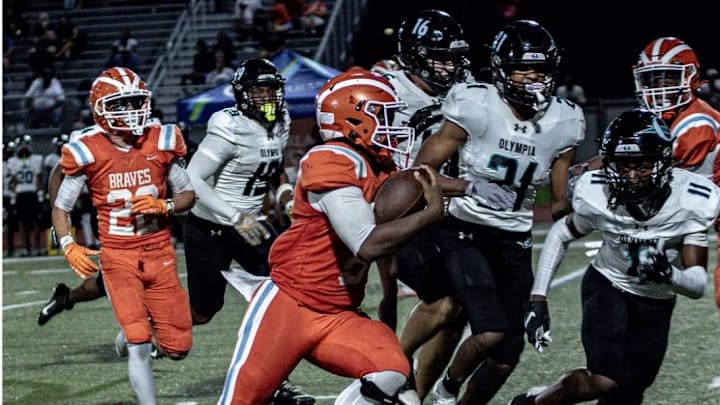 Boone running back Aaron Hardy, shown here in an earlier game against Olympia, ran 26 times for 176 yards and two TDs, including the game-winner with less than 2 minutes left, to rally the Braves past Winter Park, 44-38, in a key Class 7A, District 4 showdown. Boone is No. 7 in this week's High School on SI Top 10 Central Florida Football Rankings, Boone running back Aaron Hardy, shown here in an earlier game against Olympia, ran 26 times for 176 yards and two TDs, including the game-winner with less than 2 minutes left, to rally the Braves past Winter Park, 44-38, in a key Class 7A, District 4 showdown. Boone is No. 7 in this week's High School on SI Top 10 Central Florida Football Rankings,