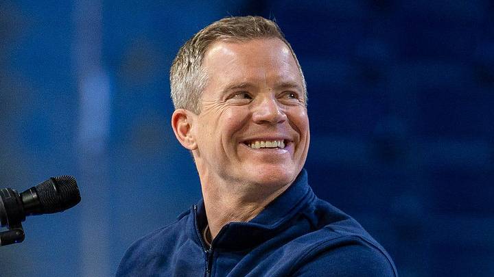 Michigan head coach Dusty May smiles at the podium during a celebration honoring the Wolverines’ NCAA men’s basketball national championship at Crisler Center in Ann Arbor on Saturday, April 11, 2026.