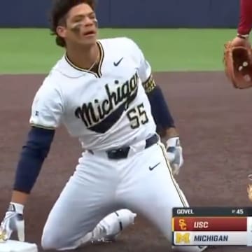 Michigan Wolverines second baseman Mitchell Voit on third base after hitting a triple.