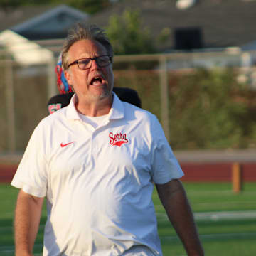 Gardena Serra football coach Scott Altenberg before Week 0's home opener against Orange Lutheran.