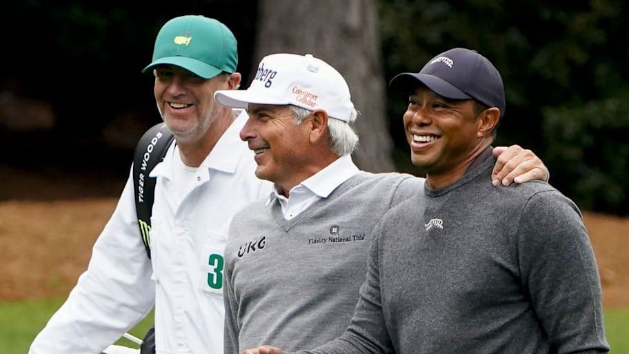 Fred Couples walks with Tiger Woods during a practice round for the 2024 Masters.