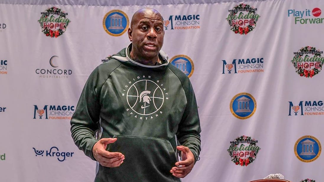 Magic Johnson speaks to the media