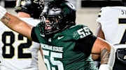 Michigan State's Ben Roberts celebrates after the Spartans blocked a Purdue field goal attempt during the second quarter on Friday, Nov. 22, 2024, at Spartan Stadium in East Lansing.