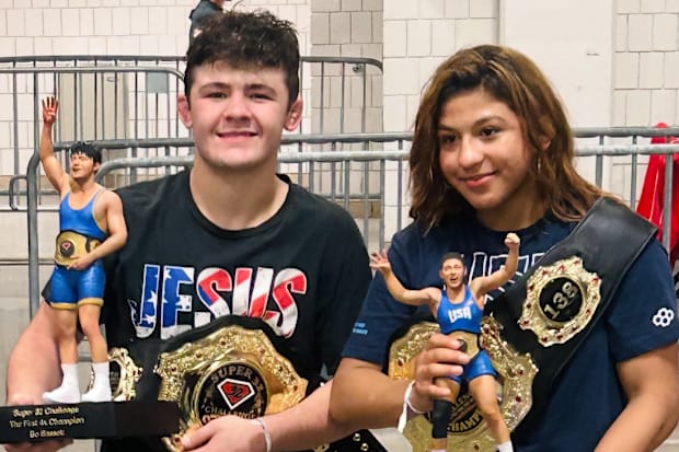 Bo Bassett (left) and Taina Fernandez show off their awards after each became the first four-time Super 32 champions.