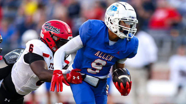 Allen junior Brett Holloway Jr. evades Cedar Hill's Carlos Porter in a 42-14 Allen win on Friday, Sept. 6, 2024.