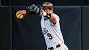 Mississippi State Bulldogs infielder Kierra Sells prepares to make a throw in a game this spring.