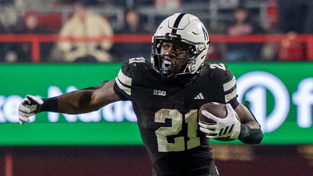 Nebraska running back Emmett Johnson rushes against USC. Nebraska running back Emmett Johnson rushes against USC.