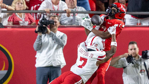 Nebraska's Malcolm Hartzog Jr. breaks up a fourth-quarter Cincinnati pass.