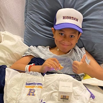 JP Tofi, the 10-year-old brother of Riordan senior and Oregon-signee Tommy Tofi is battling acute myeloid leukemia in a UCSF Benloff Children's Hospital with the support of a large family and Riordan community. 