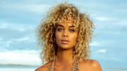 Jasmine Sanders was photographed by Yu Tsai in Tampa, Fla. Swimsuit by NHall Resort Wear. Earrings by SOKO.