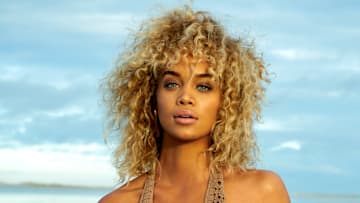 Jasmine Sanders was photographed by Yu Tsai in Tampa, Fla. Swimsuit by NHall Resort Wear. Earrings by SOKO.