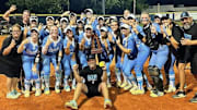 Hagerty High's softball team celebrates its Class 7A, Region 1 championship victory against Lake Brantley. The Huskies advanced to this week's state semifinals in Longwood.