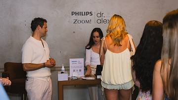 Dr. Alex and staff during SI Swimsuit Social Club