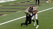 Saints quarterback Spencer Rattler got trucked after throwing an interception to Buccaneers linebacker Anthony Nelson.