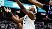Michigan State's Cam Ward, left, is blocked by Duke's Patrick Ngongba during the first half on Saturday, Dec. 6, 2025, at the Breslin Center in East Lansing.