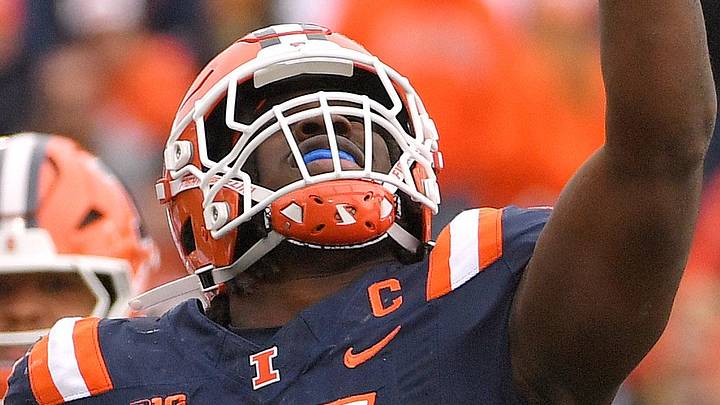 Nov 1, 2025; Champaign, Illinois, USA;  Illinois Fighting Illini linebacker Gabe Jacas (17) celebrates his sack on Rutgers Scarlet Knights quarterback Athan Kaliakmanis (16) during the first half at Memorial Stadium. Mandatory Credit: Ron Johnson-Imagn Images