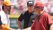 Tennessee Volunteers coach Tony Vitello and Arkansas Razorback coach Dave Van Horn before Sunday's Super Regional at Baum-Walker Stadium.