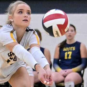 Dallas Highland Park senior Georgia Whann digs the ball during a playoff game against Lake Belton. 