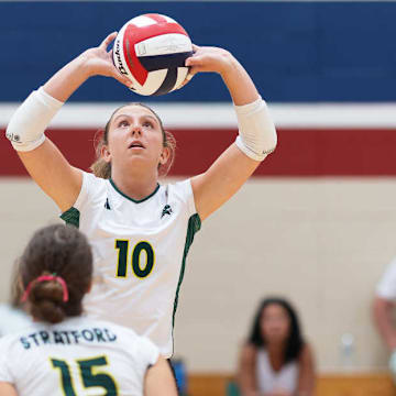 Houston Straford's Audrey Cook sets the ball in a game against Fulsher. The Spartans are in the Class 6A Division II regional finals. 