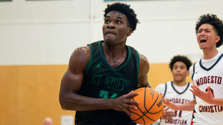 St. Joseph-Santa Maria senior Tounde Yessoufou about to send up a pretty floater right before the end of the first half of his team's 67-62 win over Modesto Christian at the 2025 De La Salle MLK Classic in Concord, Calif. Yessoufou, a Baylor commit, had 25 points and 12 rebounds. St. Joseph-Santa Maria senior Tounde Yessoufou about to send up a pretty floater right before the end of the first half of his team's 67-62 win over Modesto Christian at the 2025 De La Salle MLK Classic in Concord, Calif. Yessoufou, a Baylor commit, had 25 points and 12 rebounds.