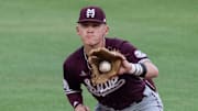 Mississippi State Bulldogs' Sawyer Reeves (2) fields a bouncing ground ball as Auburn Tigers baseball takes on Mississippi State Bulldogs at Plainsman Park in Auburn, Ala.