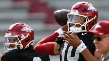 Arkansas Razorbacks quarterbacks Malachi Singleton and Taylen Green during passing drills at a spring practice inside Razorback Stadium in Fayetteville, Ark.