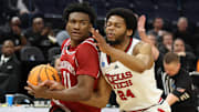 Arkansas Razorbacks guard Karter Knox drives for a layup against the Texas Tech Red Raiders in the Sweet 16.
