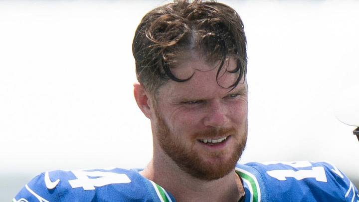 Seattle Seahawks quarterback Sam Darnold talks with fans
