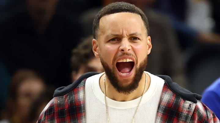 Feb 5, 2026; Phoenix, Arizona, USA; Golden State Warriors guard Stephen Curry celebrates against the Phoenix Suns in the second half at Mortgage Matchup Center. Mandatory Credit: Mark J. Rebilas-Imagn Images
