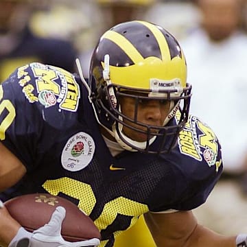 Jan 1, 2005; Pasadena, CA, USA: FILE PHOTO; Michigan Wolverines running back Mike Hart (20) in action against the Texas Longhorns during the 2005 Rose Bowl at the Rose Bowl. The Longhorns defeated the Wolverines 38-37. Mandatory Credit: Richard Mackson-USA TODAY Network