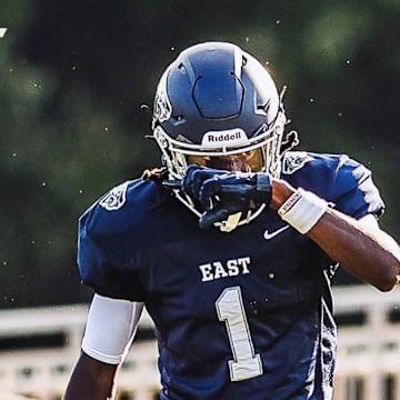 Receiver JP Gilchrist caught 8 passes for 158 yard and three touchdowns in East Forsyth's 49-14 rout of A.C. Reynolds.